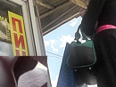 Upskirt video with young angel in the black dress