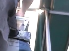 Young upskirt girl shows the awesome smooth legs