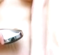 Thin teenager washing body in the bath tube