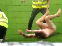 Nude maniac runs around the football field