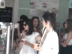 Smoking hot celebrity walks around in a flimsy shirt and tight pants