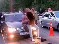 The mad stripper angel in Russian Federation on the car race show