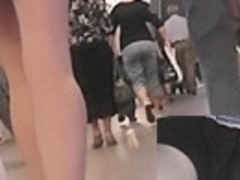 Leggy angel widens legs and shows upskirt