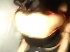 Voyeur cam from above catches a couple fucking in a bathroom stall