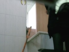 Candid camera video of a sexy asian schoolgirl pissing