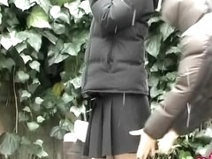 Asian babe gets a cold skirt sharking on a snowy day.
