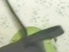 After pissing on toilet the Asian cutie reaches orgasm