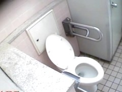 Schoolgirl talks to her bf and masturbates on toilet spy cam