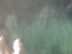 Three hot people having sex in the water