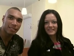 Brunette Aurora gives blowjob to two dicks in public toilet