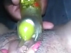 Nasty black girl plays with her pierced pussy and dildo