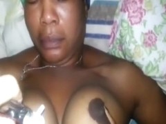 Haitian MILF loves cock between her tits