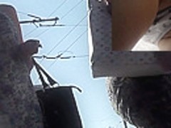 Yummy upskirt views of the chubby brunette lady