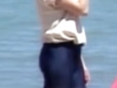 Short tight shorts on the amateur doll on the beach 01zq