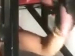 Using his hanging cock and balls as a punchbag