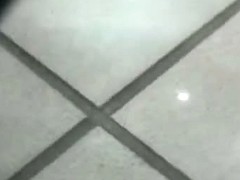 Blonde hussy lets a voyeur peek up her skirt