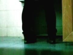 Cute skinny girl is taking a piss in the toilet with a spy cam