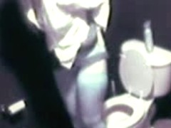 Blonde in high heels and lingerie rubs pussy in toilet voyeur