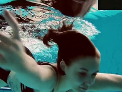 Tattooed Baby Swirls Underwater